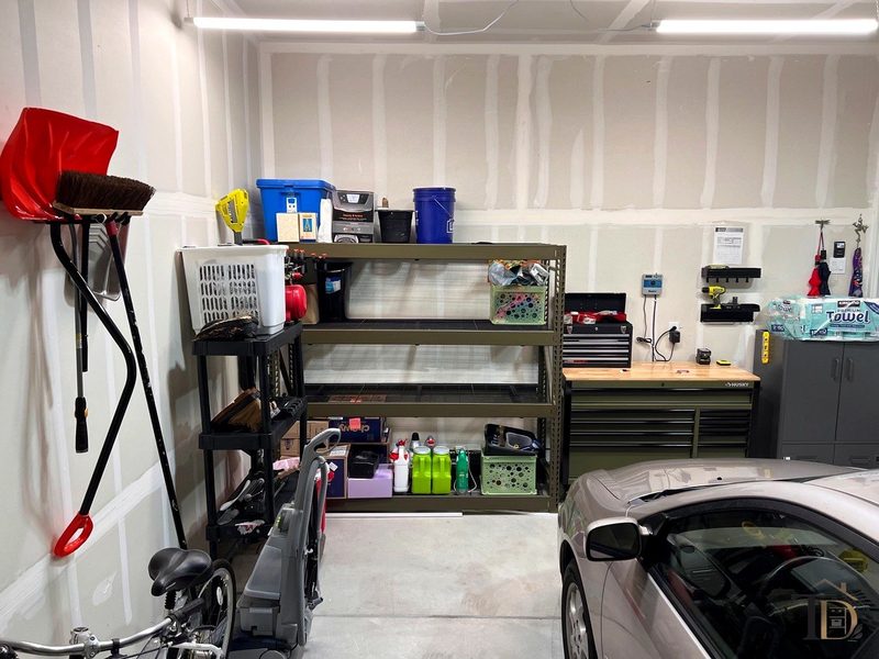 Garage reclaimed and zoned by Temptation Designs in Elizabeth, Colorado — after photo