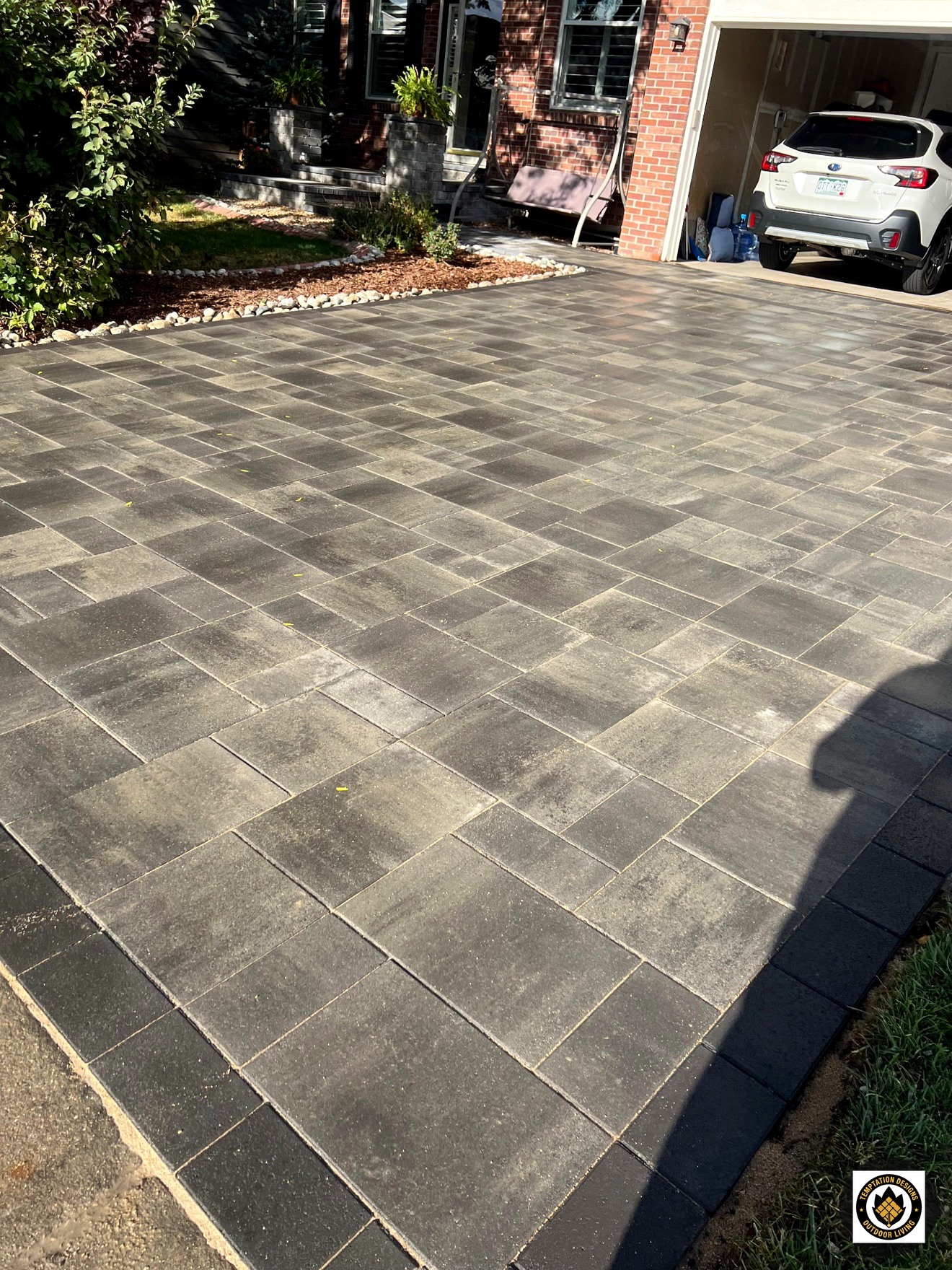 Custom paver driveway with contrasting border