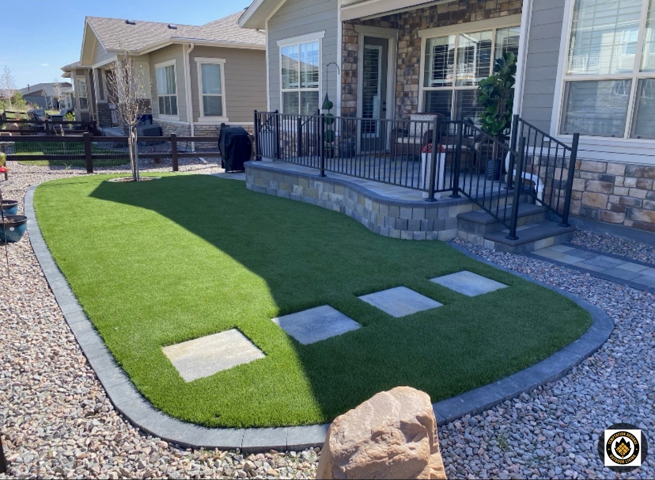 Artificial turf front lawn with paver step pads