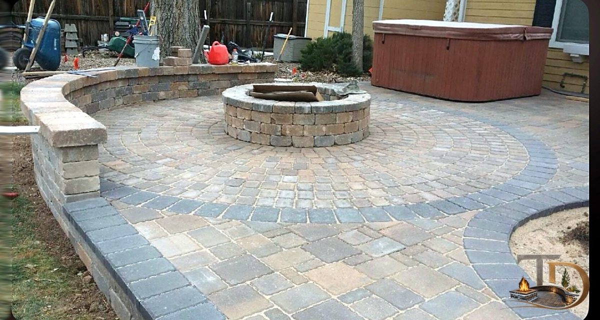 Preparing the compacted base for a fire pit