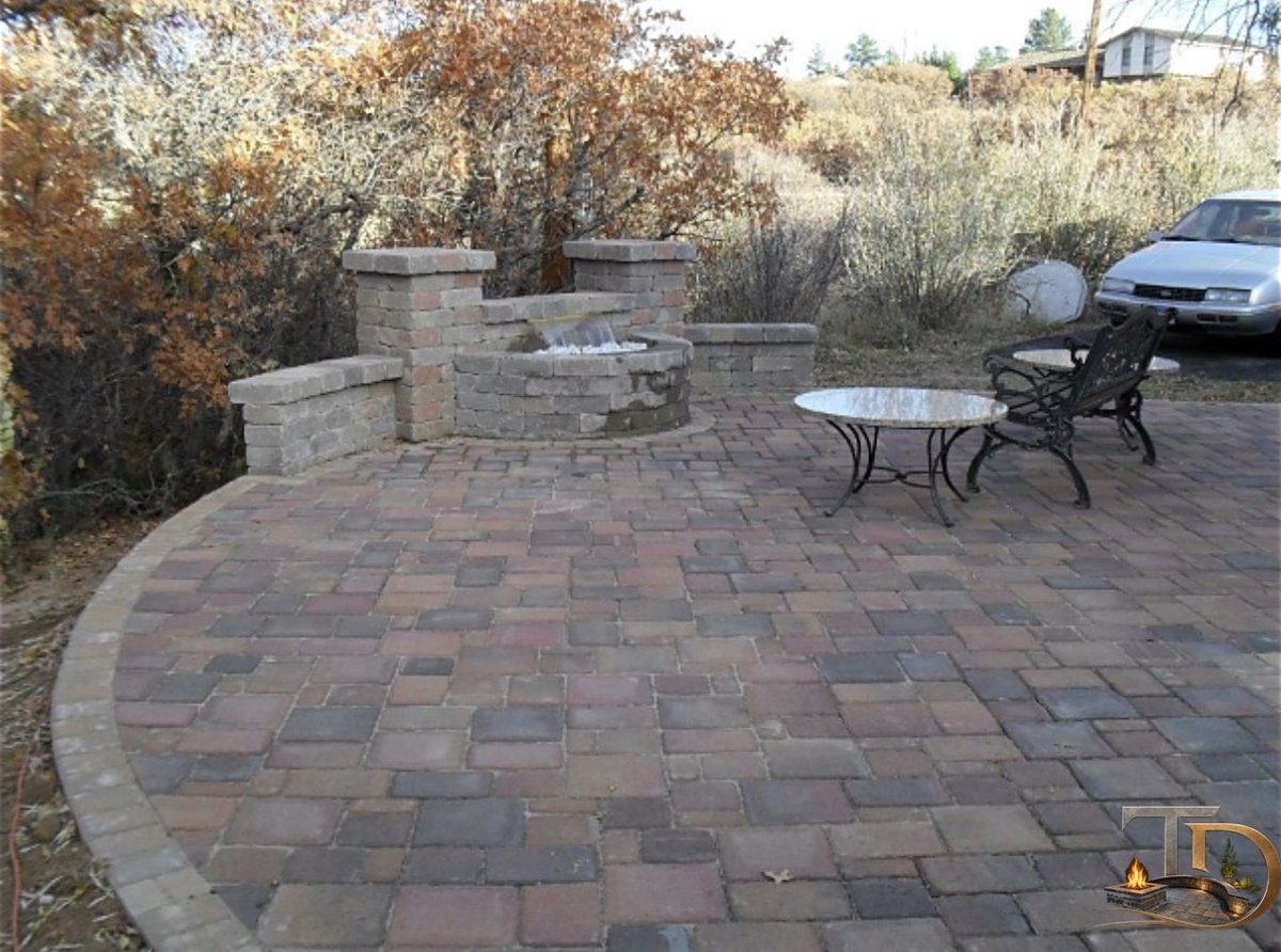 Sealed paver patio in a Denver backyard